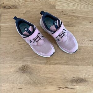 On Running Pink and Black Sneakers